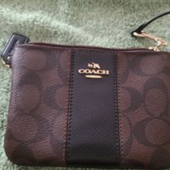 Coach Handbags - Coach brown and black small wristlet